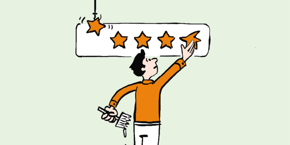 a man putting up a star on a rating display