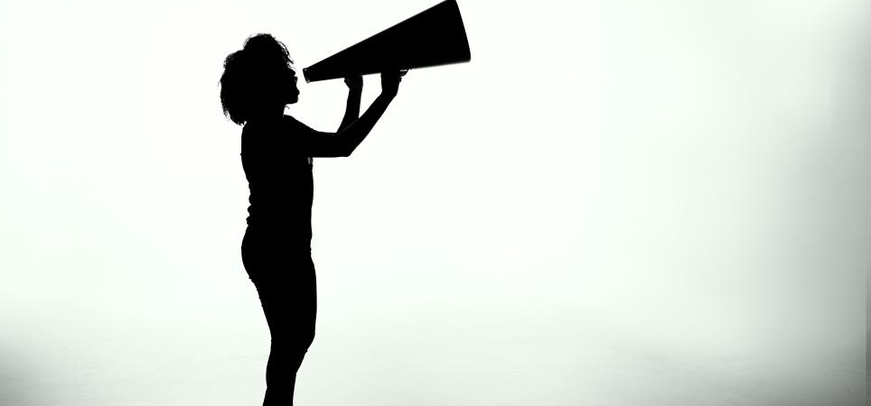 woman shouting into megaphone